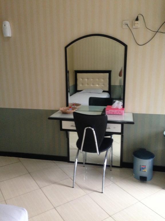 Global Inn Keluarga Sedati Zimmer foto