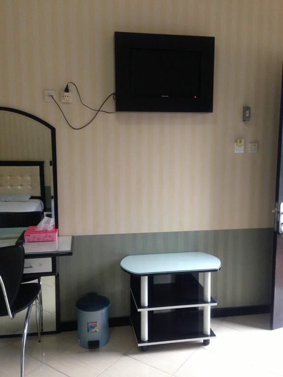 Global Inn Keluarga Sedati Zimmer foto