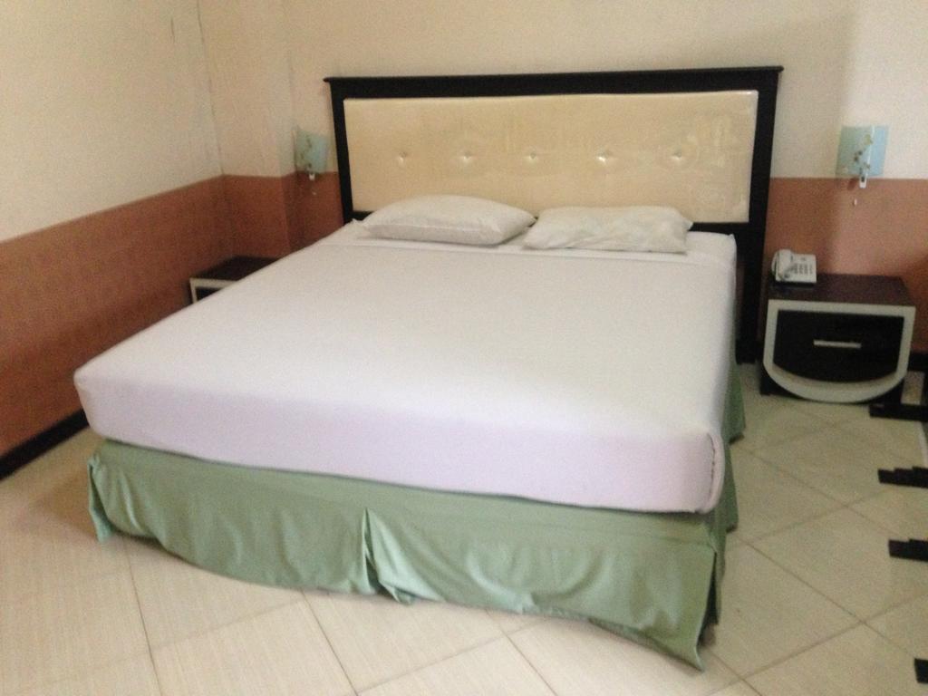 Global Inn Keluarga Sedati Zimmer foto