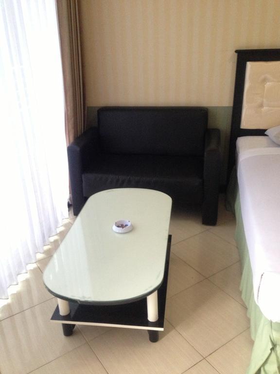 Global Inn Keluarga Sedati Zimmer foto