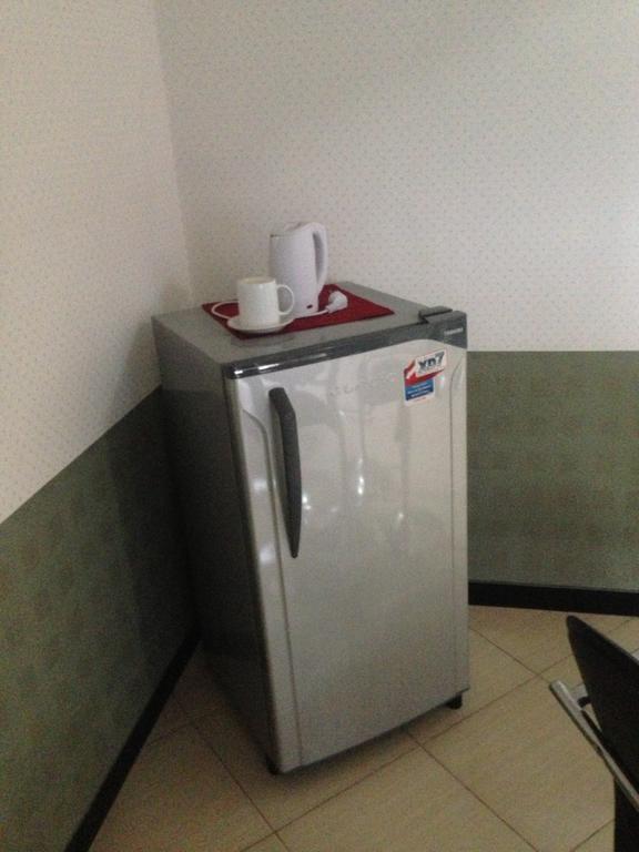 Global Inn Keluarga Sedati Zimmer foto
