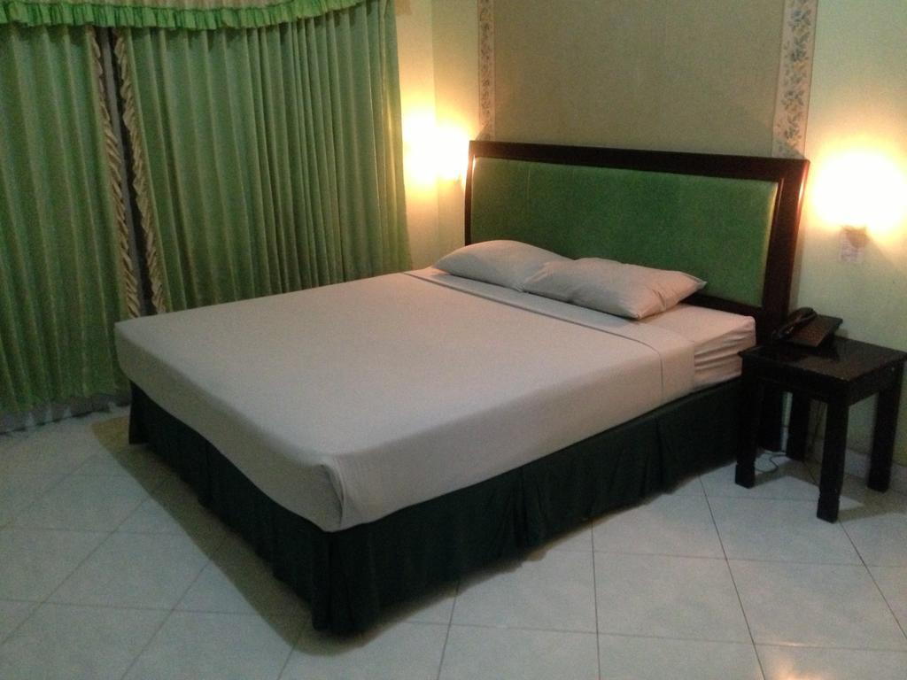 Global Inn Keluarga Sedati Zimmer foto