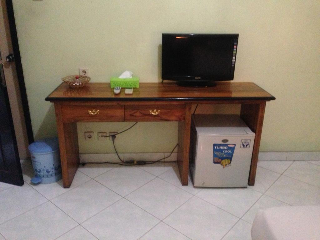 Global Inn Keluarga Sedati Zimmer foto